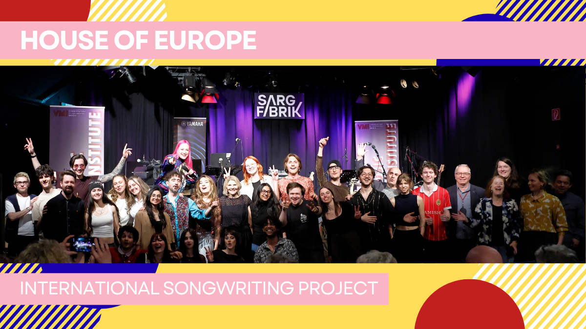 Group photo of participants in the House of Europe Project Week at the final concert at Sargfabrik in Vienna. International students and musicians stand together on stage.